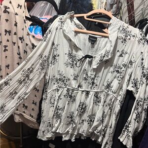 Torrid White Blouse with Black Floral Pattern
